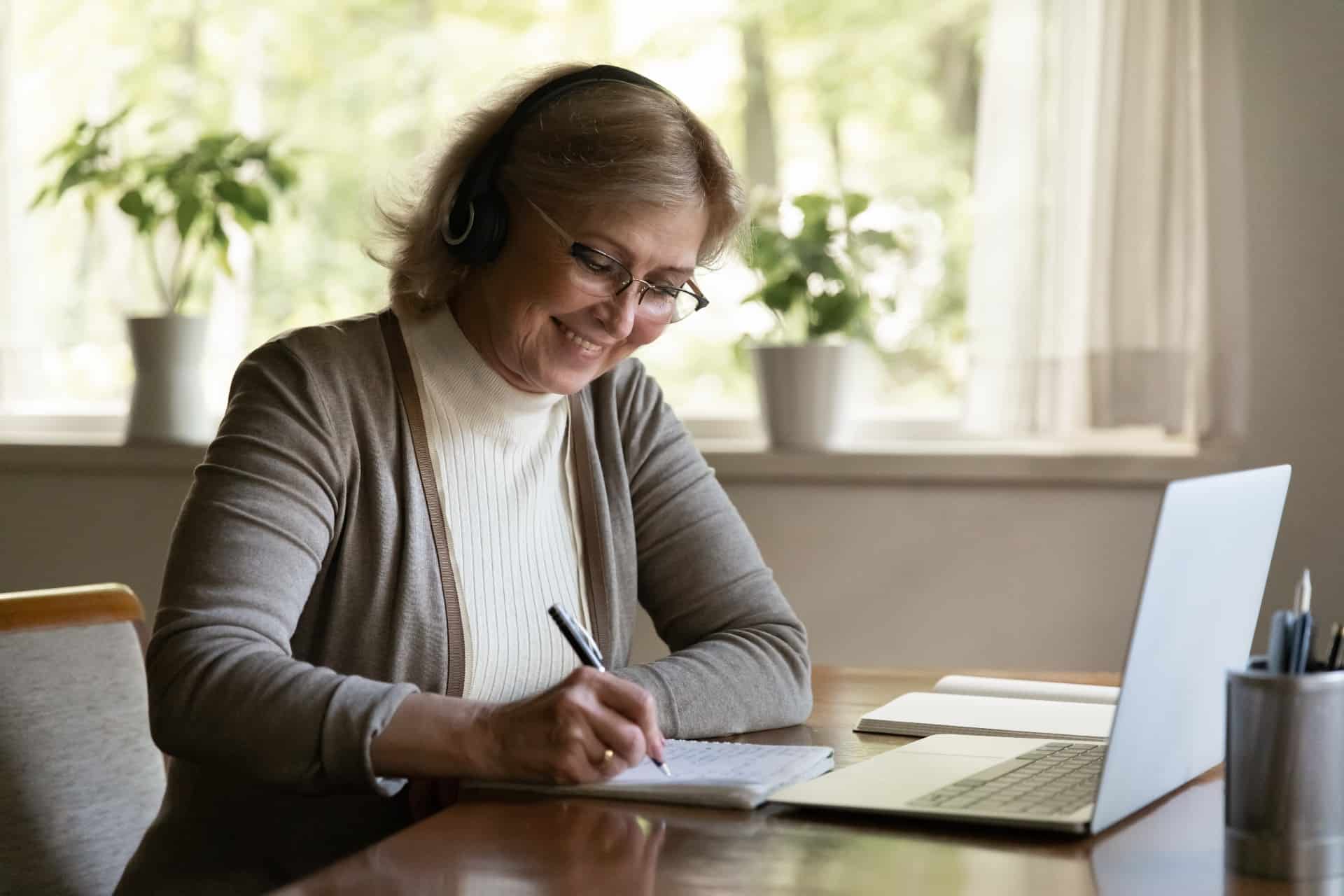 Senior woman writing