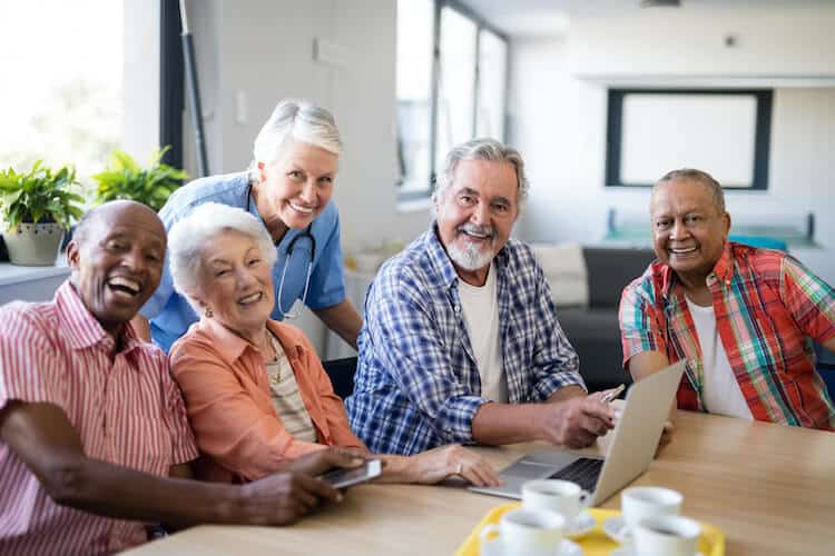 Group of senior friends at a CCRC retirement community.