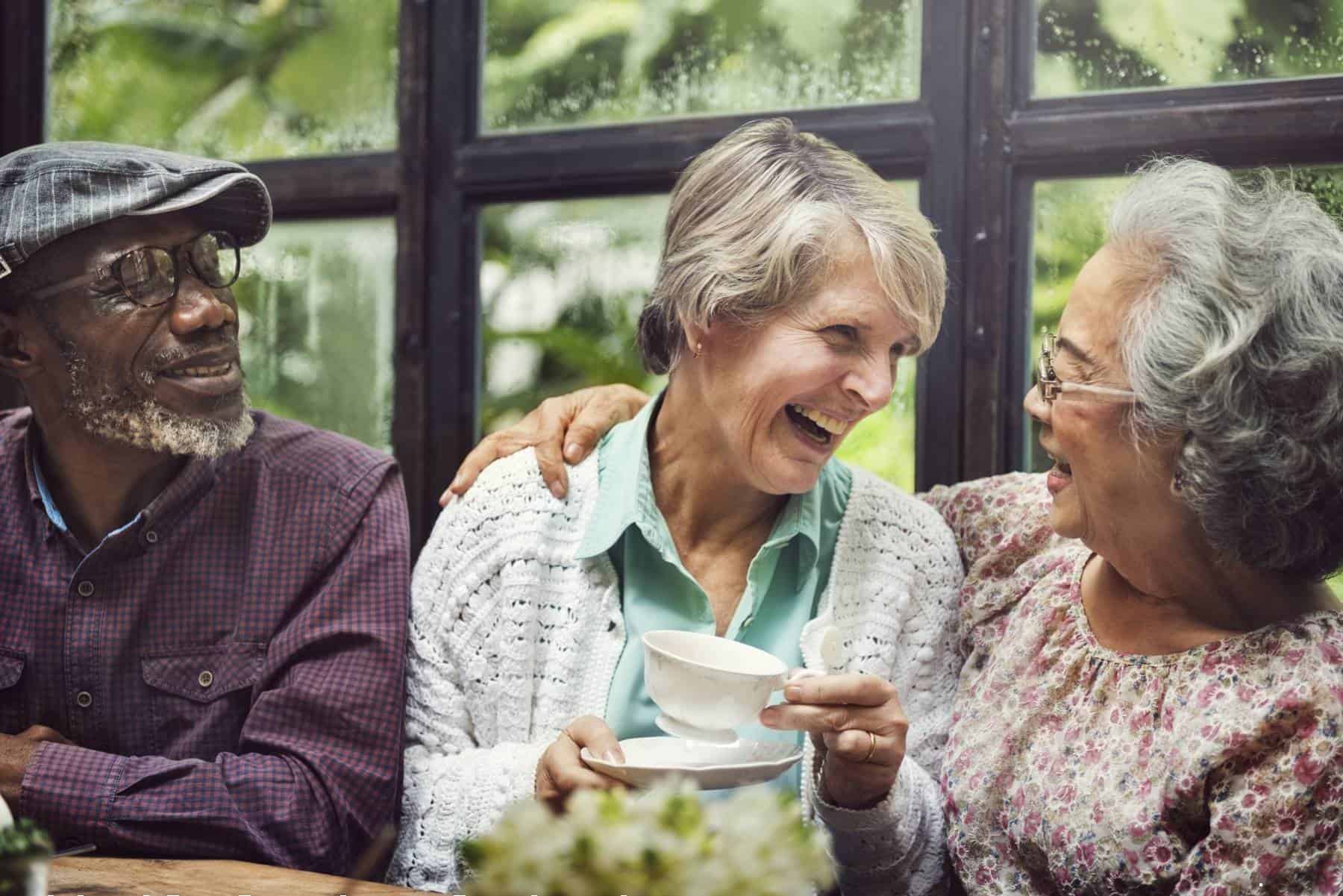 happy seniors laughing together
