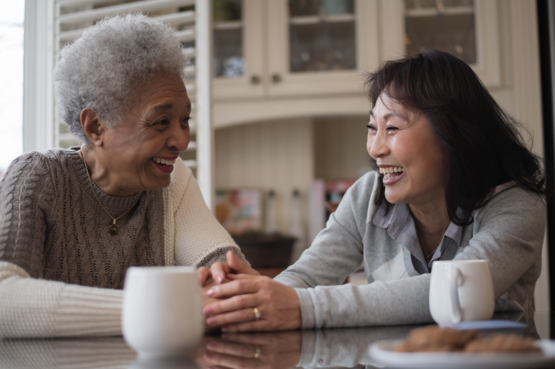 seniors talking together over coffee