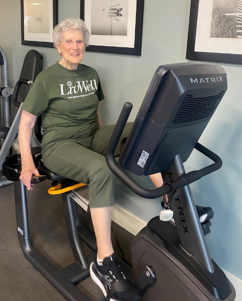 senior woman working out on an exercise bike