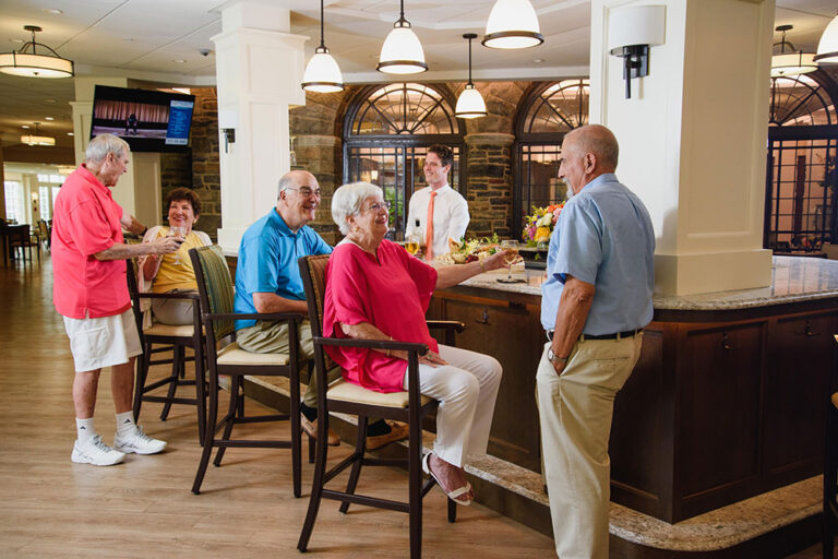 seniors sitting at a bar socializing