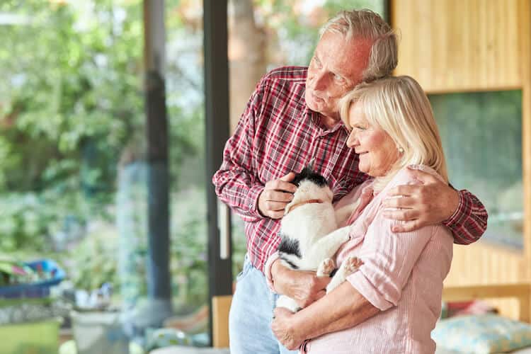 A senior couple feeling living with security in retirement.
