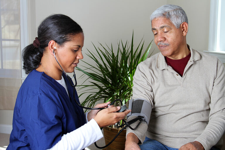 Home health care worker and an elderly couple