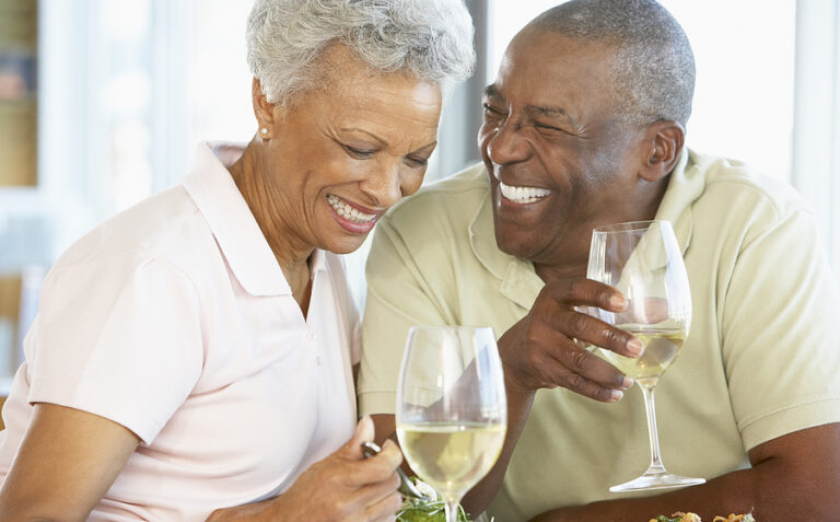 seniors drinking wine together