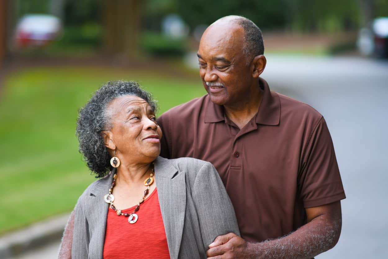 senior couple posing for a picture